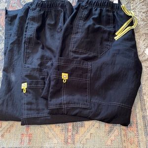 two pairs of black scrub pants!